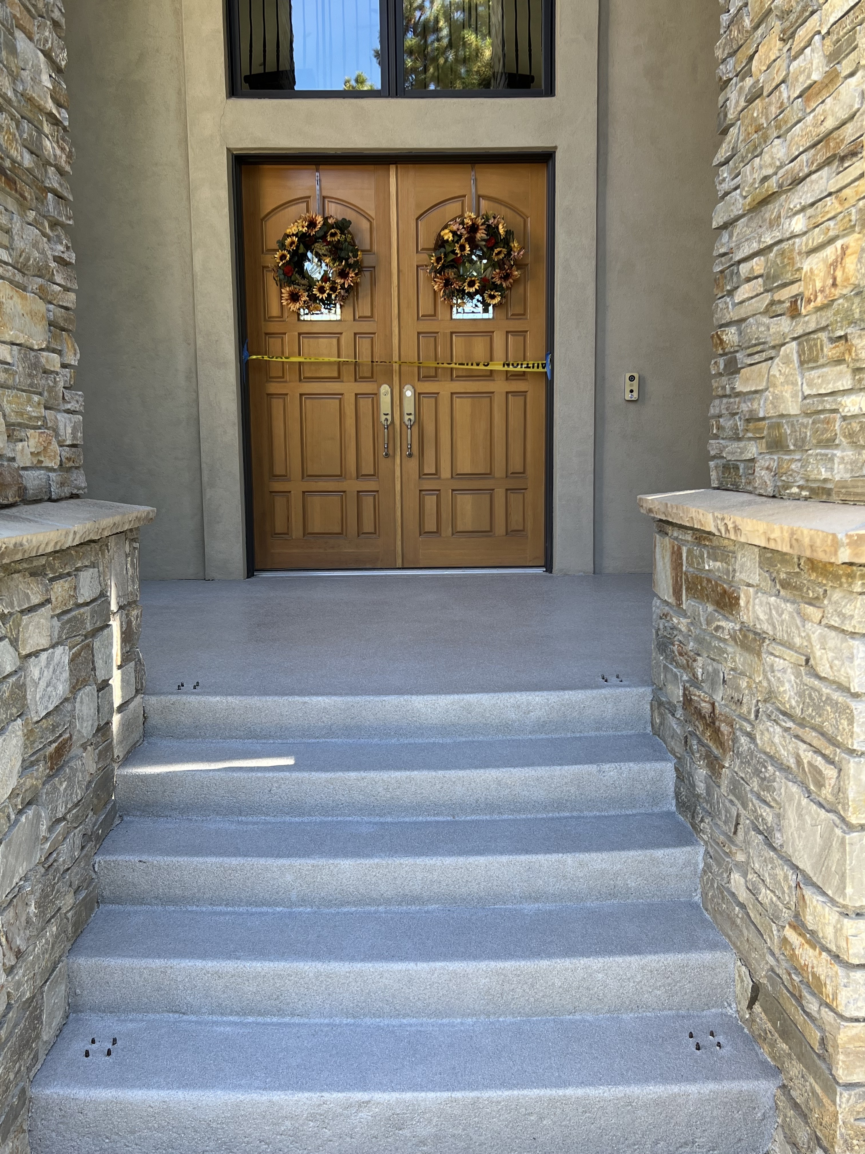 Entry steps coated with gray flake system