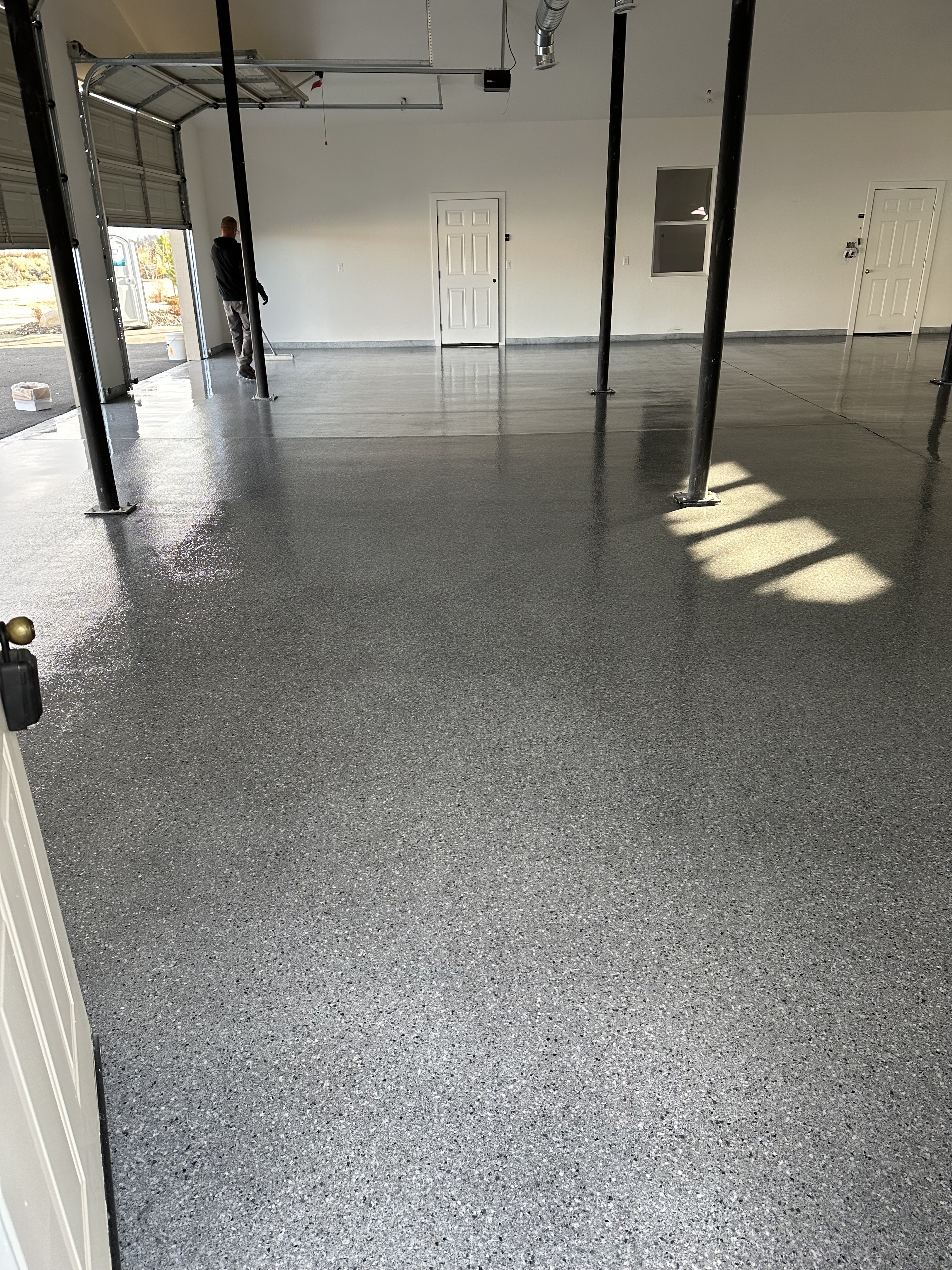 Residential garage with gray flake floor